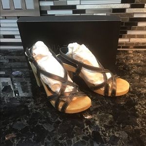 Strappy, leather, platform block heel sandal.